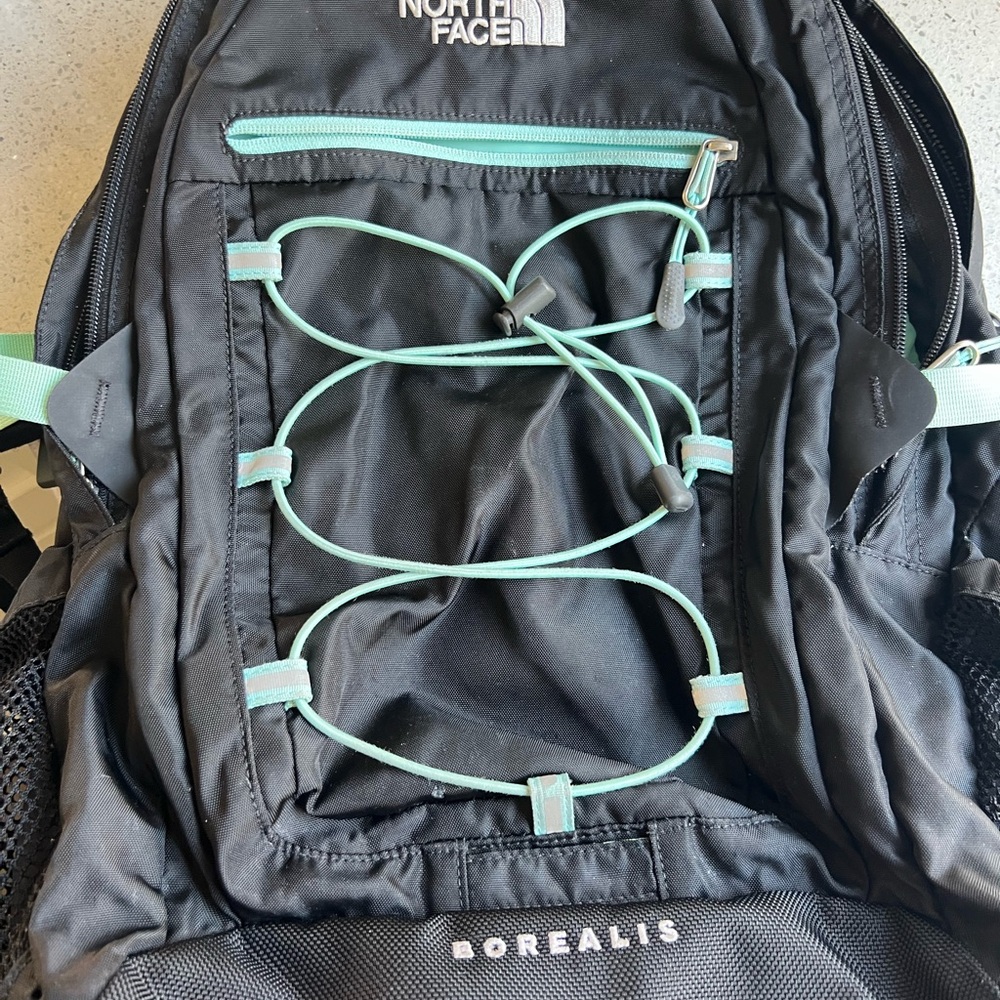The North Face Black Backpack with Teal Details